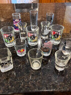 Lot of 16 Shot Glasses All in excellent condition.  Nice variety
